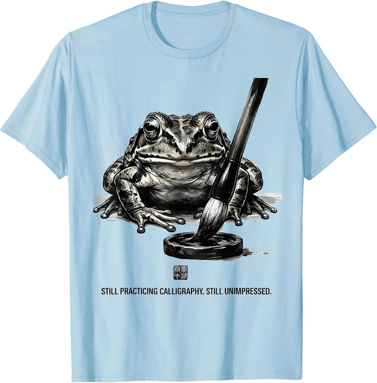 Men's Still Practicing Calligraphy. Still Unimpressed. Grumpy Frog T-Shirt - Baby Blue